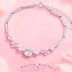 NWOT Sanrio Hello Kitty Bracelet with Sakura Charm Accent   New